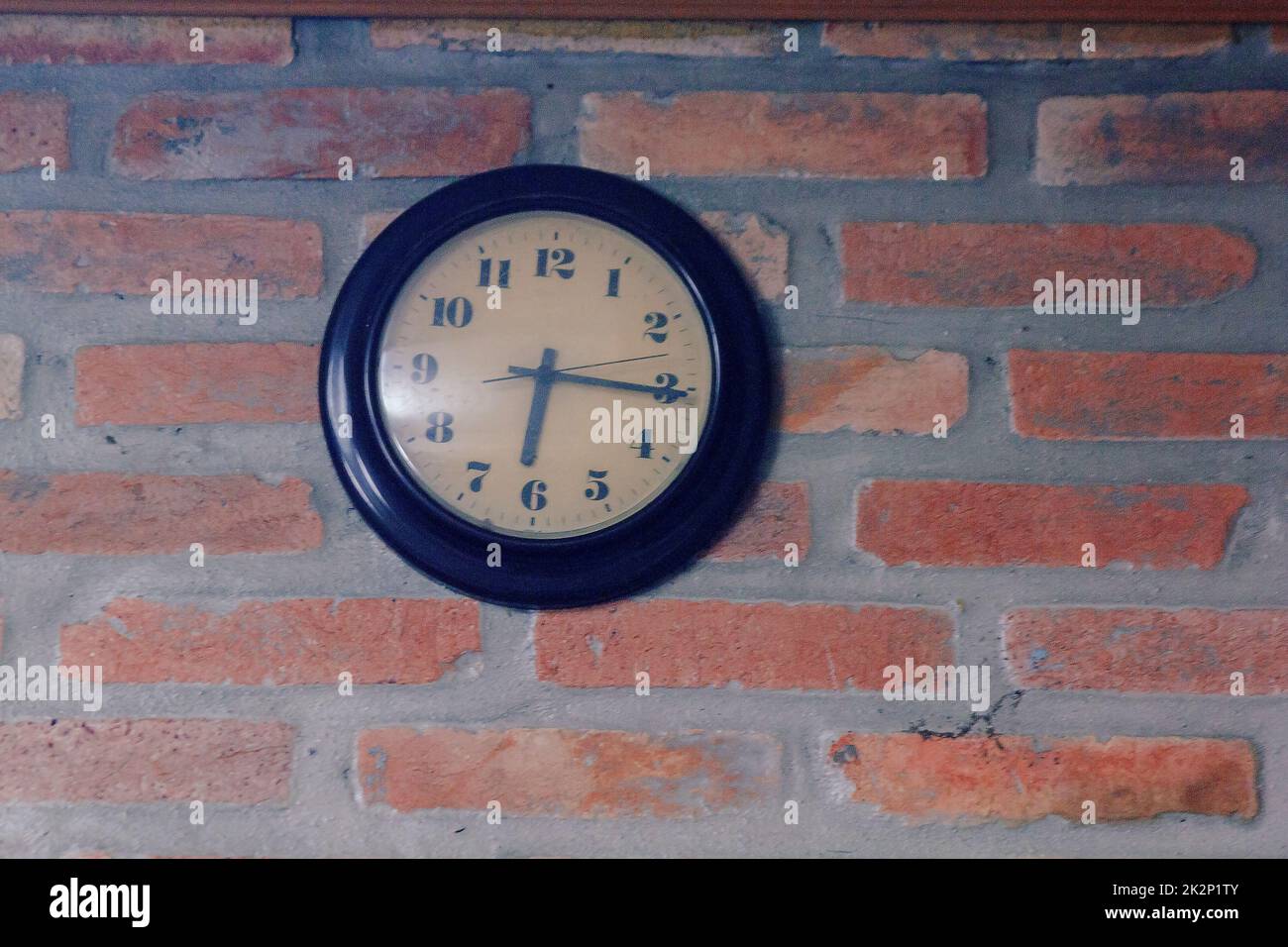 Brick wall with clock hires stock photography and images Alamy