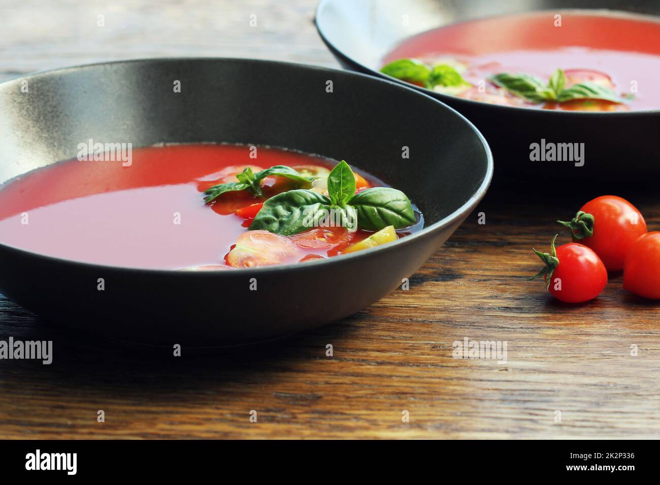 Homemade Gazpacho tomato soup in brown bowl. Healthy eating concept Stock Photo