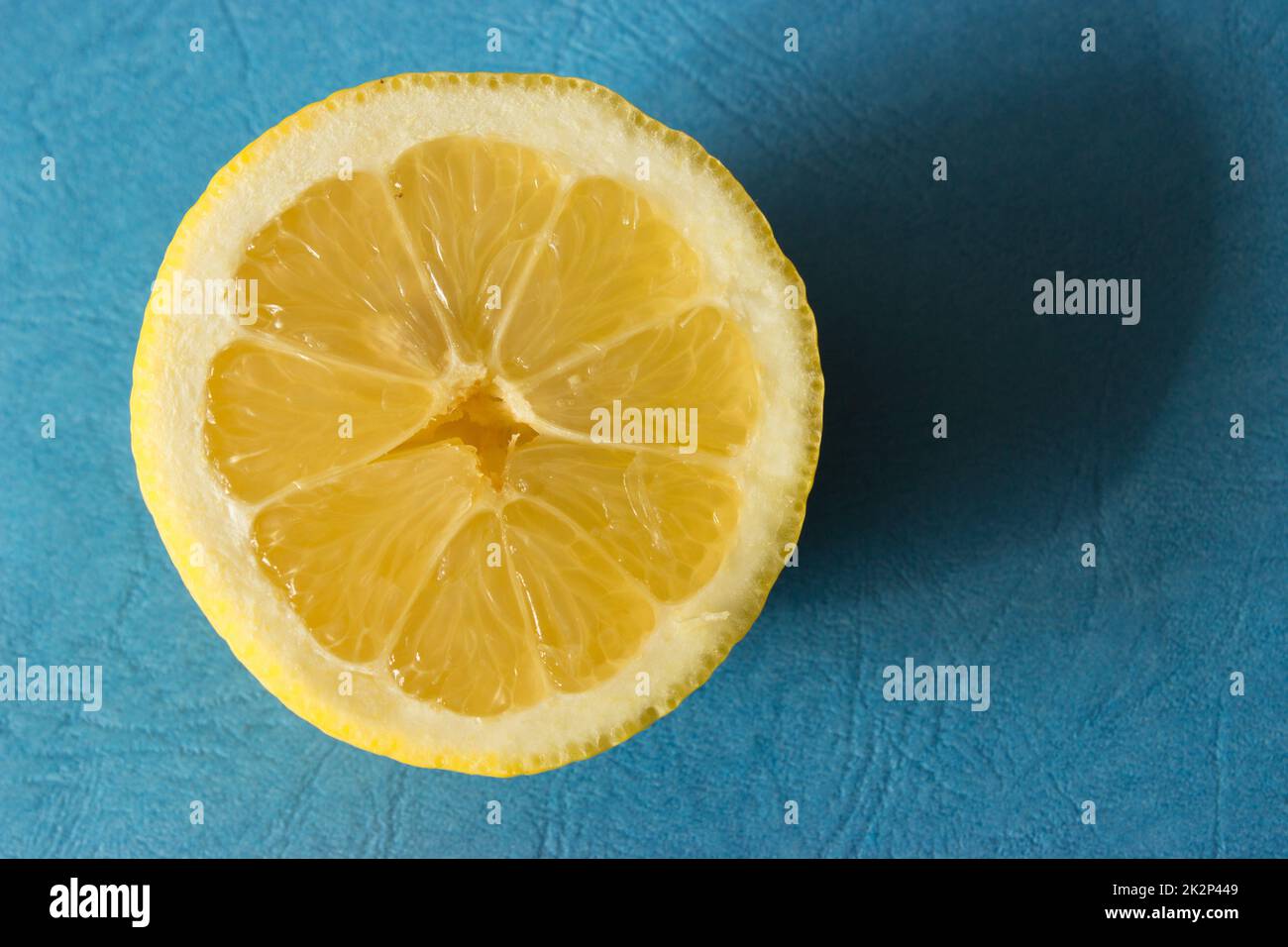 Lemon cut in half Stock Photo - Alamy