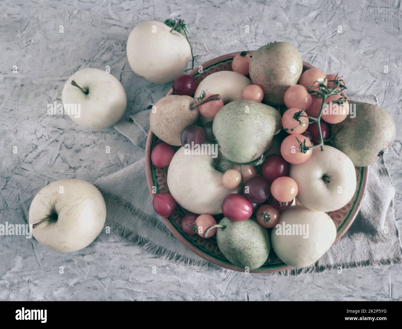 Fruit on the table in a ceramic plate Stock Photo