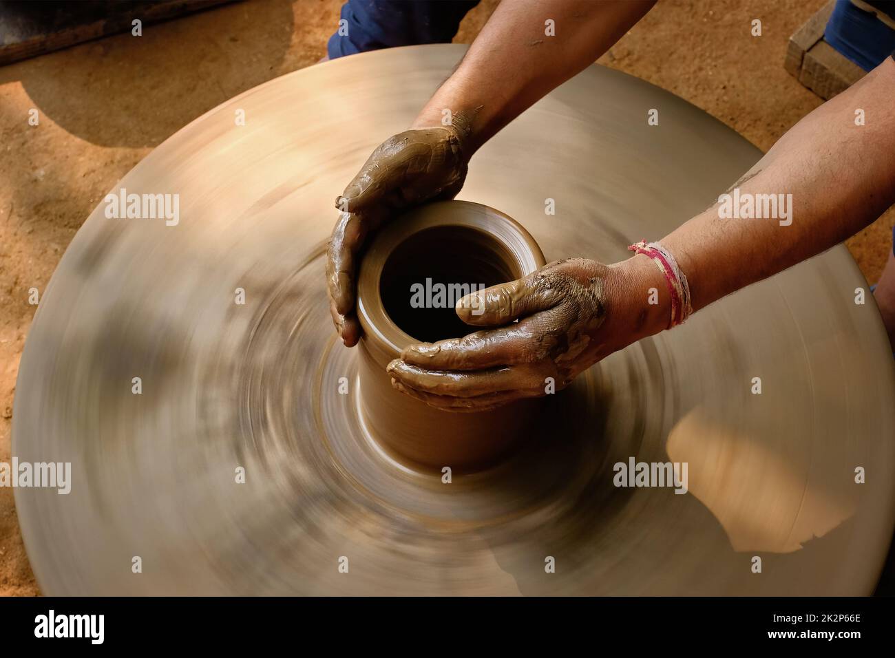 Indian potter hands at work, Shilpagram, Udaipur, Rajasthan, India