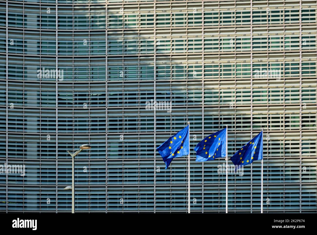 EU flags in front of European Commission Stock Photo