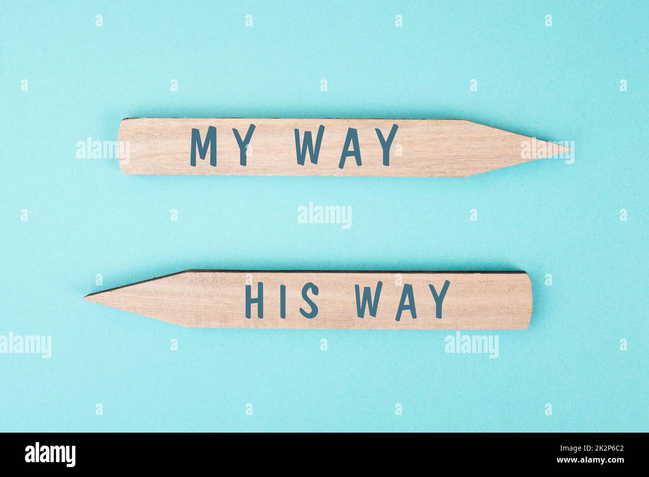 The words my way his way are standing on wooden arrows, christian religion faith, trust and believe concept, religious pray Stock Photo