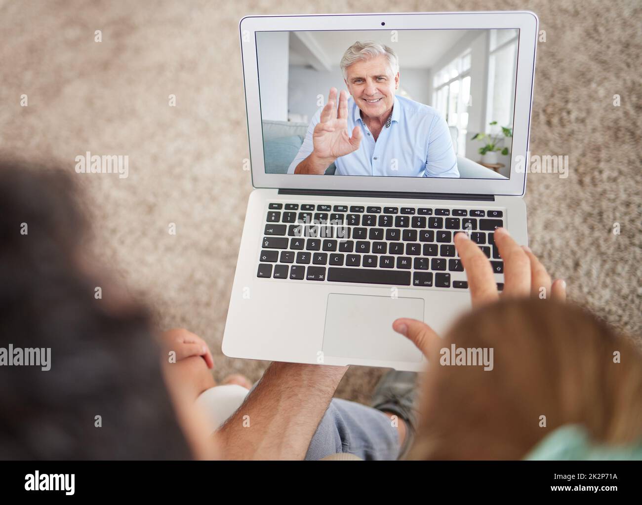 Love, family and laptop video call with senior man waving hello on digital internet screen. Online app webcam communication with happy and smiling Stock Photo