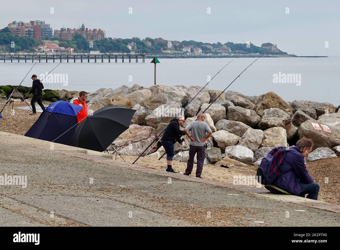 Felixstowe, Suffolk, UK - 23 September 2022 : Fishermen and their tents on the beach. Stock Photo
