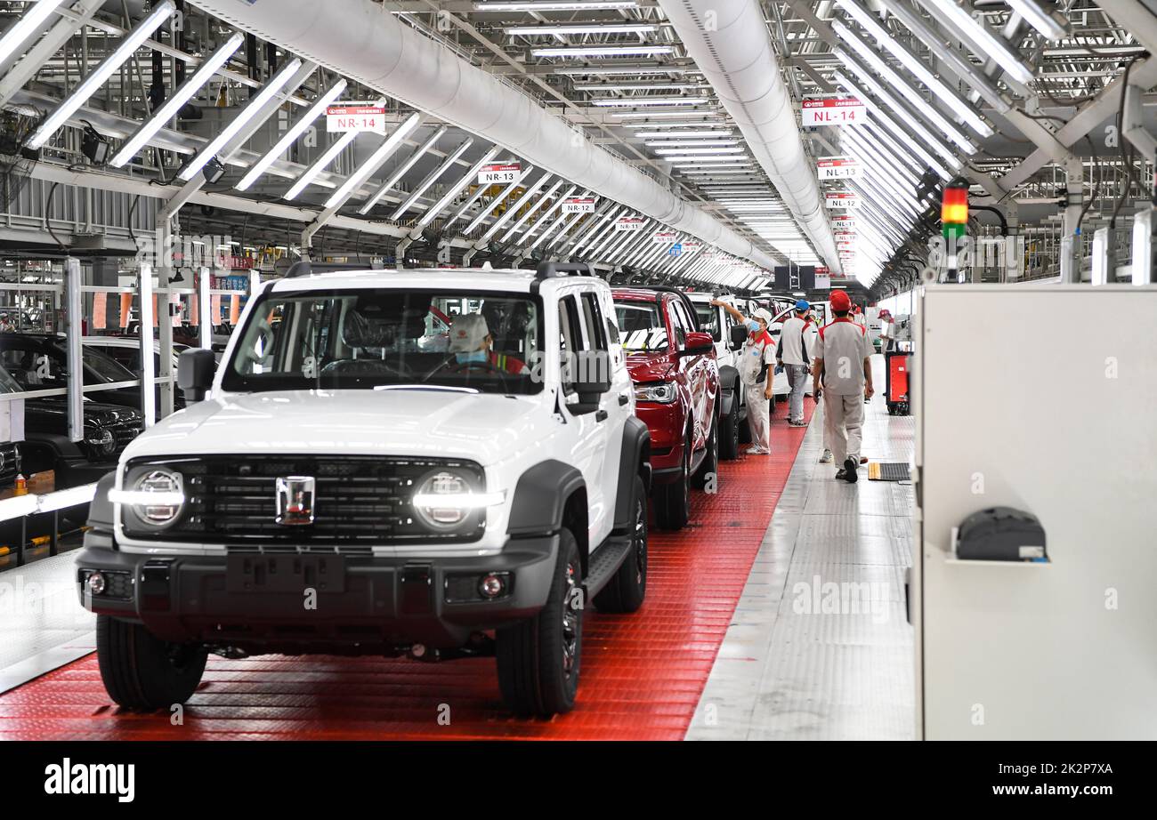 Chongqing. 22nd Sep, 2022. Workers work at an intelligent production base of the Great Wall Motors (GWM) in Yongchuan District of southwest China's Chongqing, Sept. 22, 2022. In recent years, Yongchuan District of Chongqing has focused on the development of smart manufacturing which features integrated industrial Internet, big data, artificial intelligence. Smart manufacturing has now become a new growth driver for the local economy. Credit: Wang Quanchao/Xinhua/Alamy Live News Stock Photo