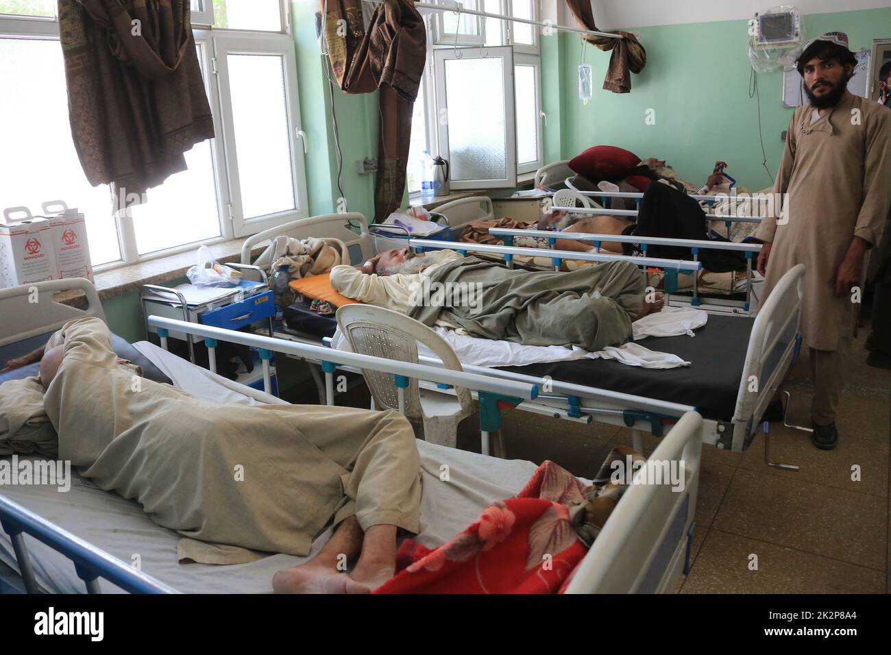 Kandahar. 21st Aug, 2022. People receive medical treatment in the China-built Mirwais Regional Hospital in Afghanistan's southern Kandahar province, Aug. 21, 2022. TO GO WITH 'Feature: China-built hospitals benefit war-torn Afghanistan' Credit: Saifurahman Safi/Xinhua/Alamy Live News Stock Photo