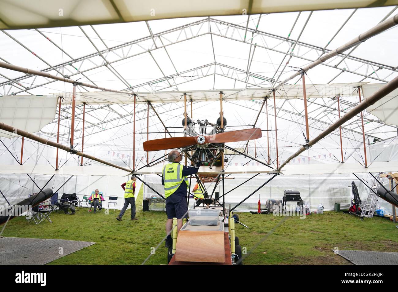A replica of Waterbird, the UK's first successful seaplane and the only one its kind in the world, is prepared before its first public flight on Lake Windermere in Cumbria. The event marks the climax of a 13-year project to create an exact copy of the Waterbird and apart from a modern engine, it faithfully recreates the detail of the original from 1911 seaplane. Picture date: Friday September 23, 2022. The replica has been constructed from wood, bamboo and wires, the same materials used to construct the original seaplane. The 35ft long aircraft, has a wingspan of 40ft and weighs just 1000lb. I Stock Photo