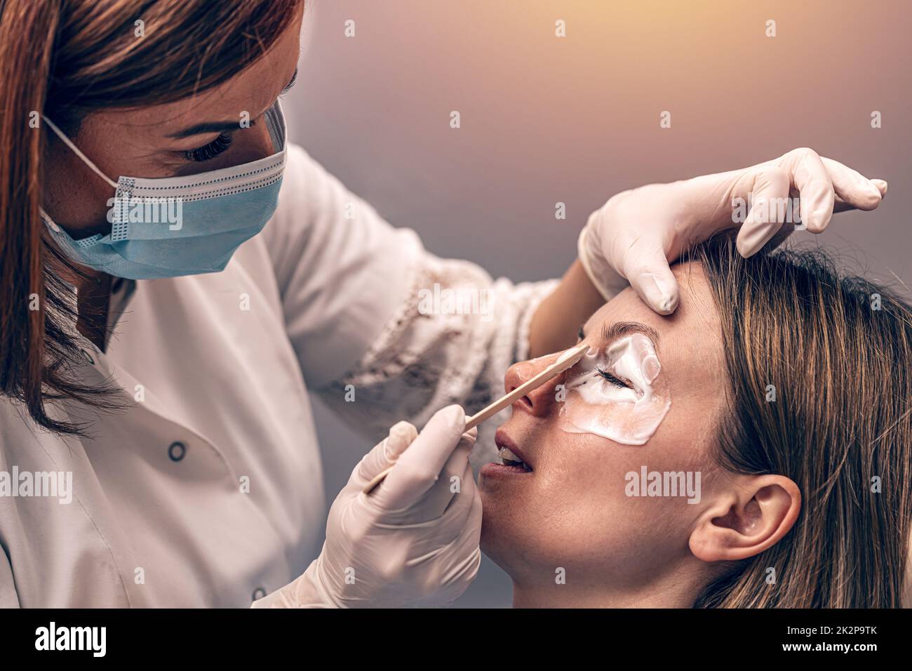 Local anesthesia in cosmetic dermatology Stock Photo