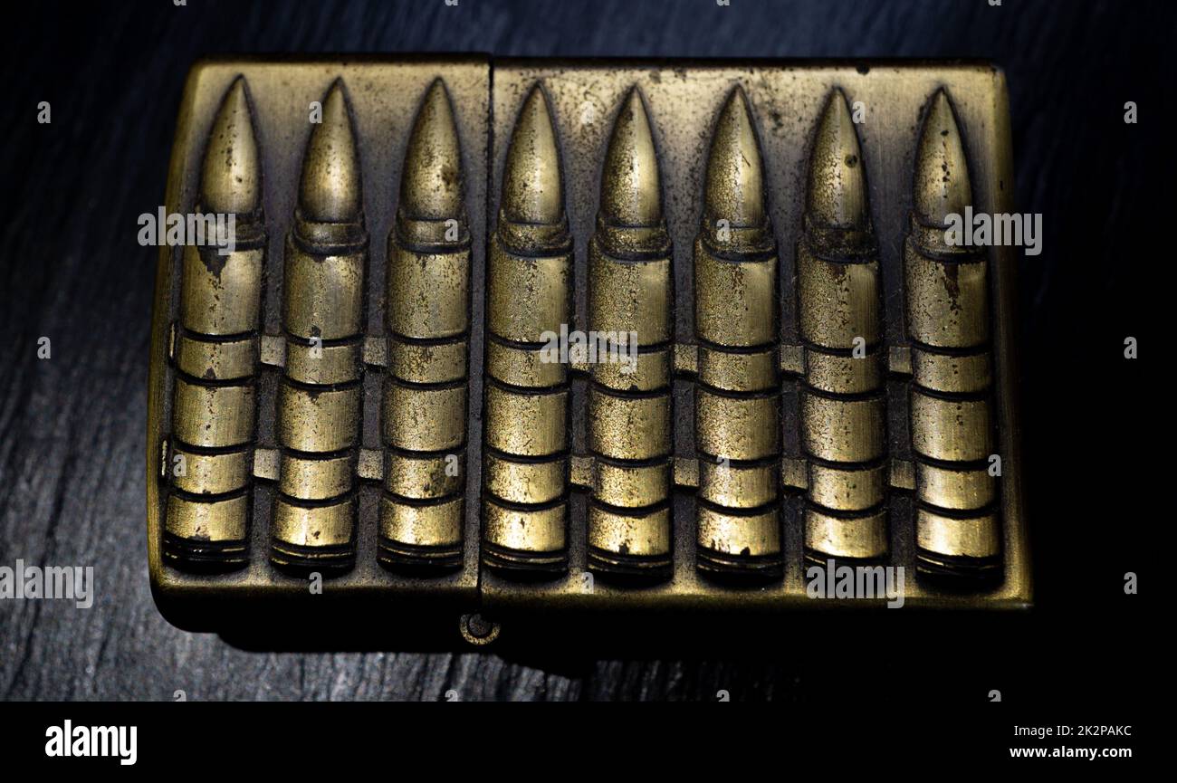 Old matches decorated with bullets Stock Photo