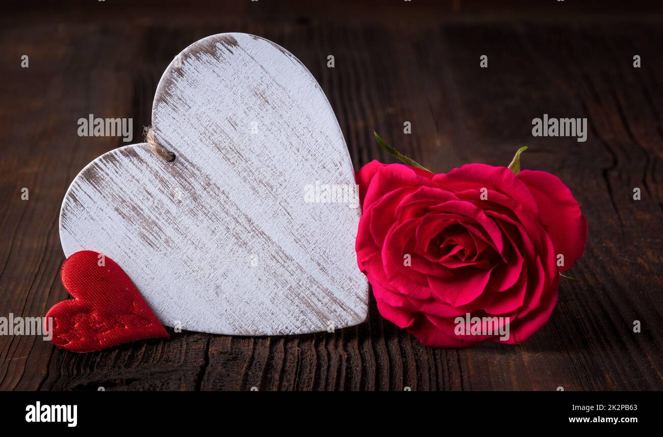 Red roses and wooden Heart for Valentine's Day February 14 and Mothers ...