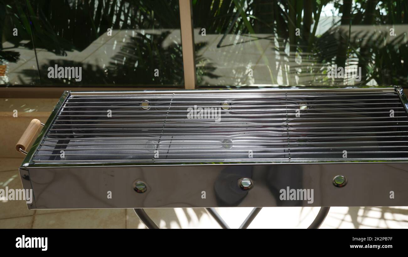 Mangal is a Middle Eastern barbecueâ€”both the event and the grilling apparatus itself. Stock Photo