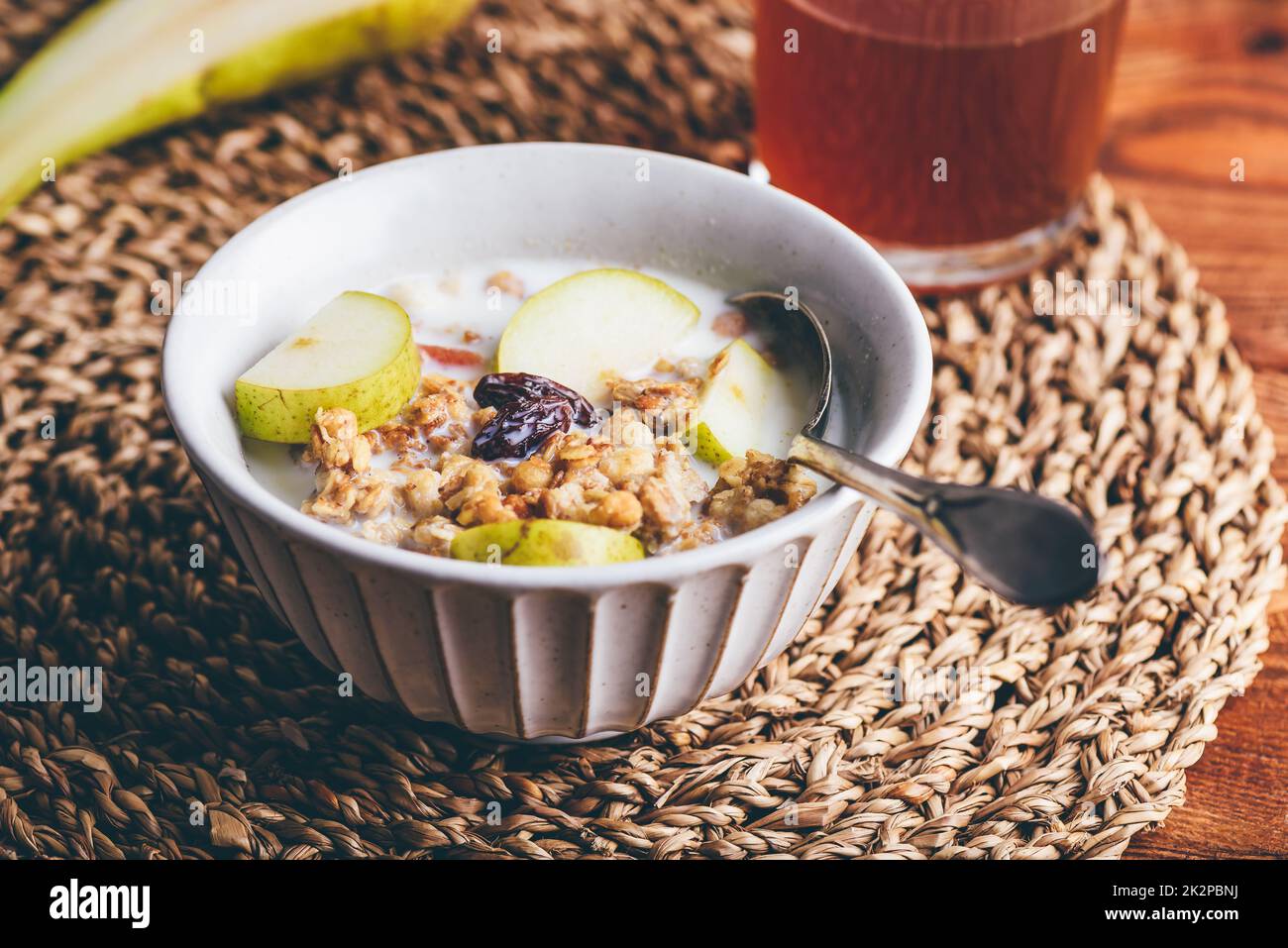 Serving of Granola with Pear and Raisins Stock Photo Alamy