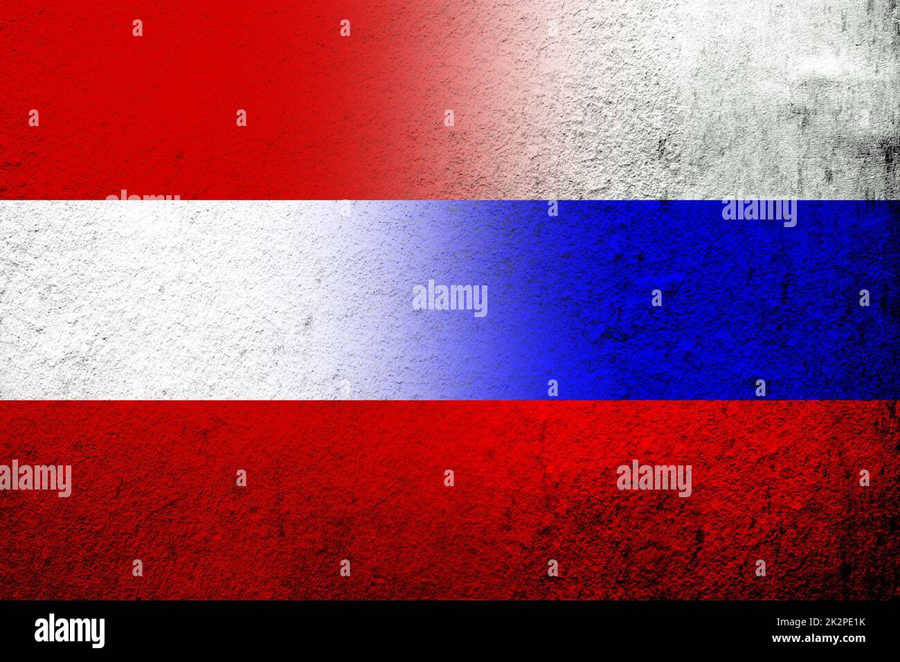 National flag of Russian Federation with National flag of Austria. Grunge background Stock Photo