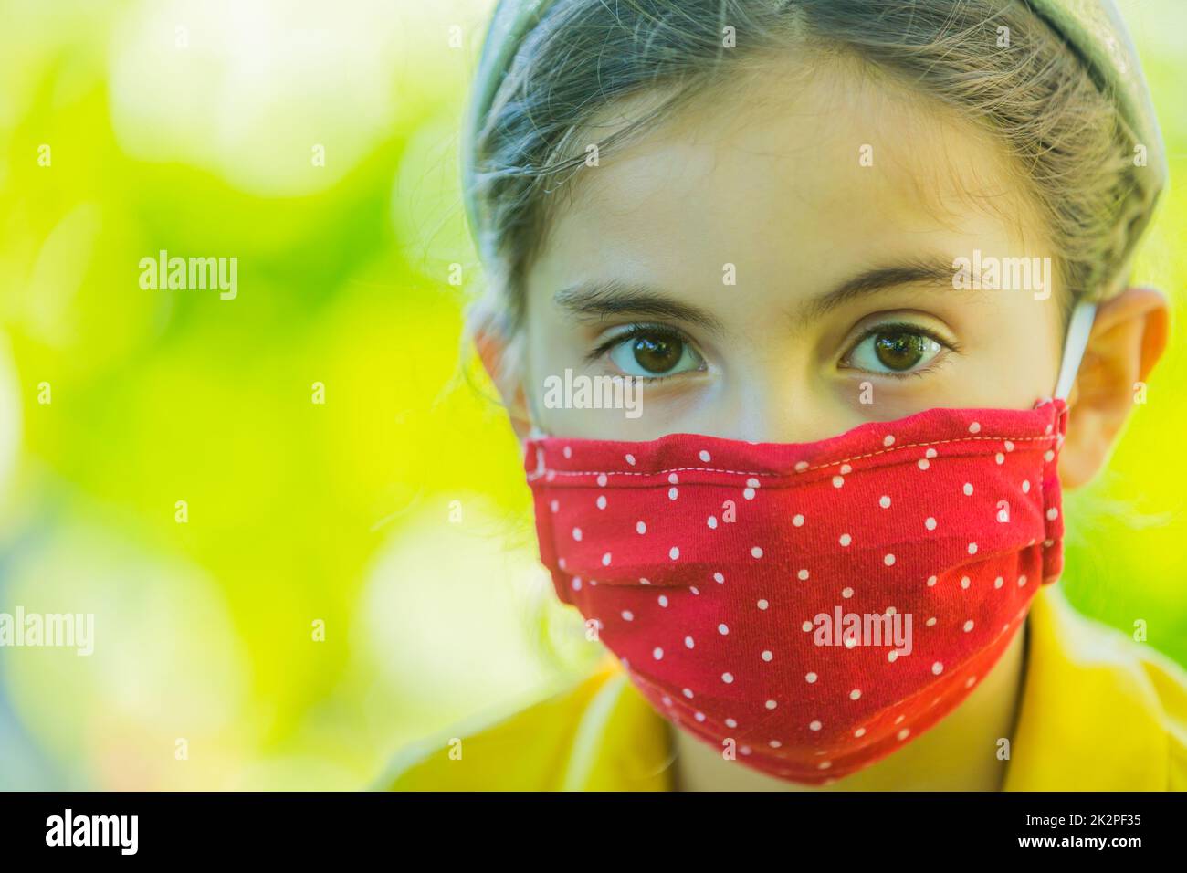 Little girl with mask Stock Photo Alamy