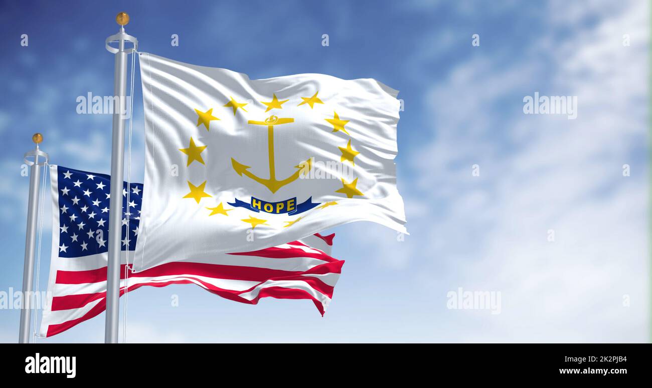The Rhode Island state flag waving along with the national flag of the United States of America Stock Photo