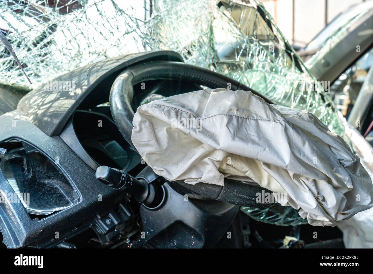 car after a car accident at a junkyard, airbag Stock Photo Alamy