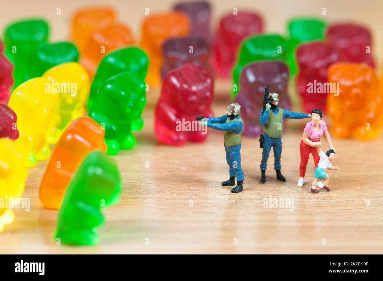 Gummy bear invasion. Harmful/ junk food concept Stock Photo Alamy