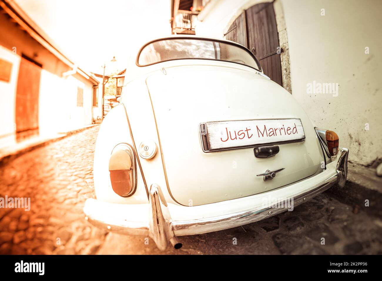 Antique wedding car with just married sign Stock Photo