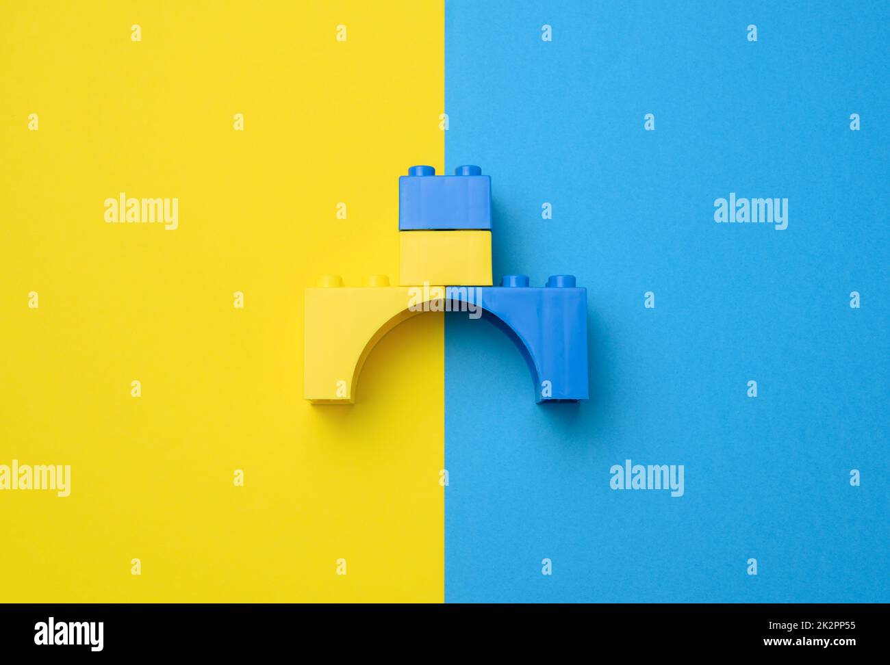 Plastic yellow-blue details of the children's designer. Children's educational game, top view Stock Photo
