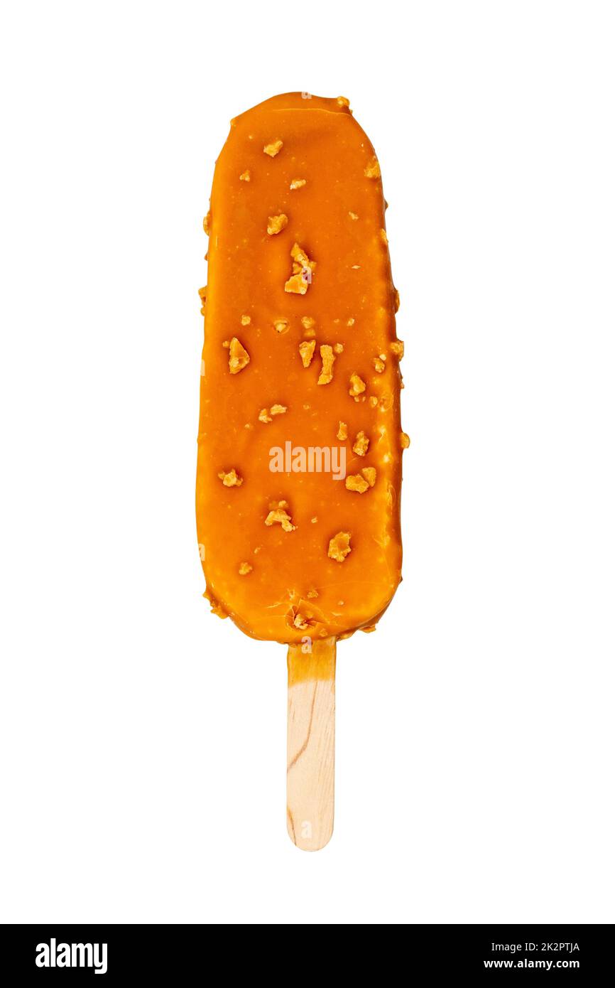 Ice cream on a stick in caramel glaze with nuts Stock Photo