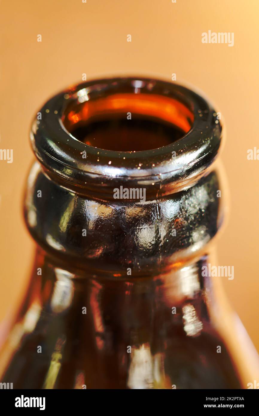 https://c8.alamy.com/comp/2K2PTXA/a-close-up-of-a-neck-of-a-glass-bottle-for-beverages-2K2PTXA.jpg
