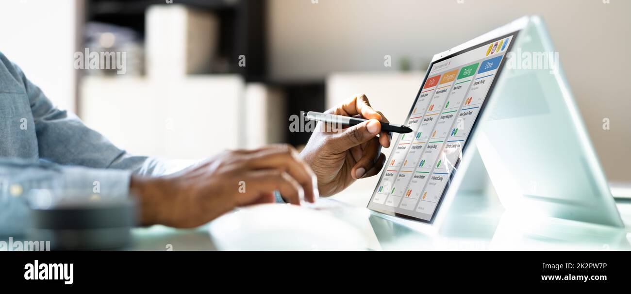 Kanban Project Management Software On Laptop Stock Photo