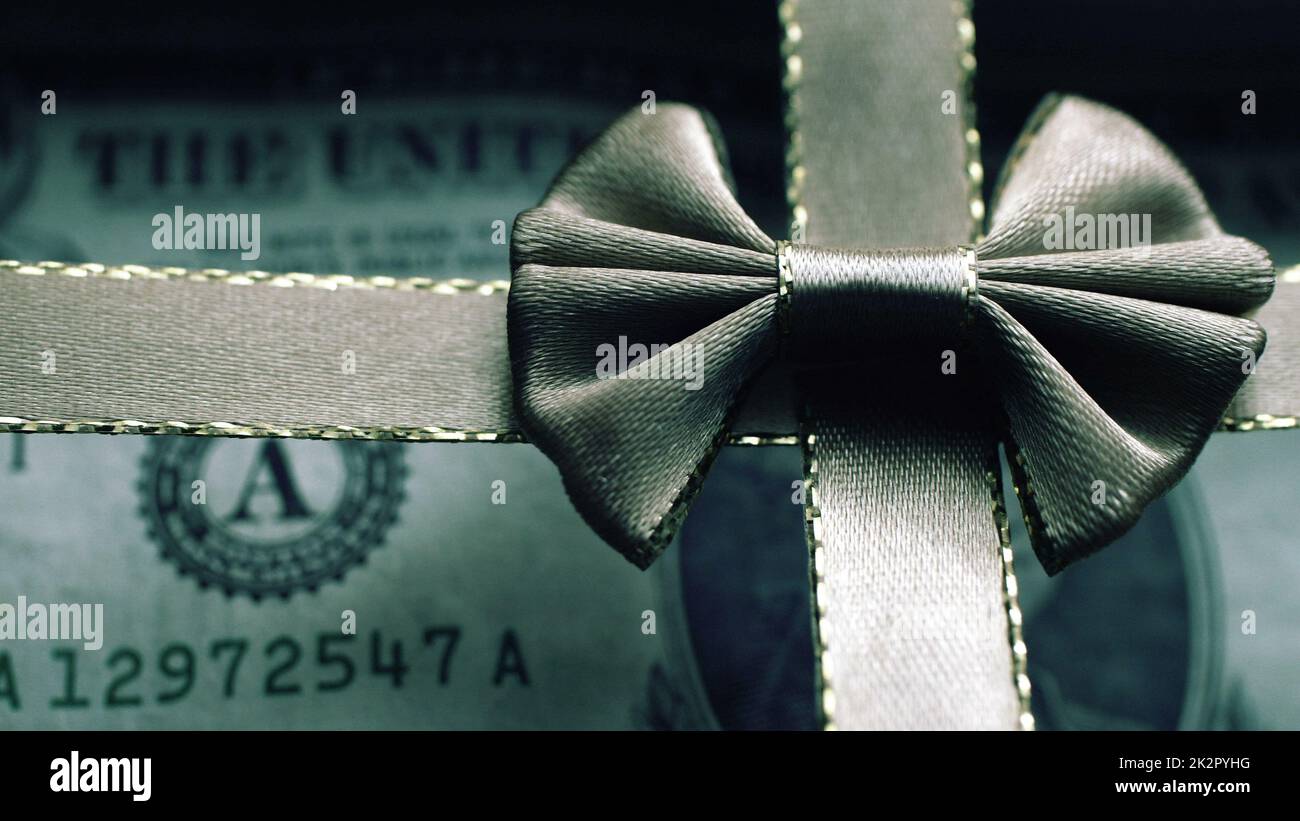 Money Wrapped In Bow Money gift of dollar bill bow hi-res stock photography and images - Alamy