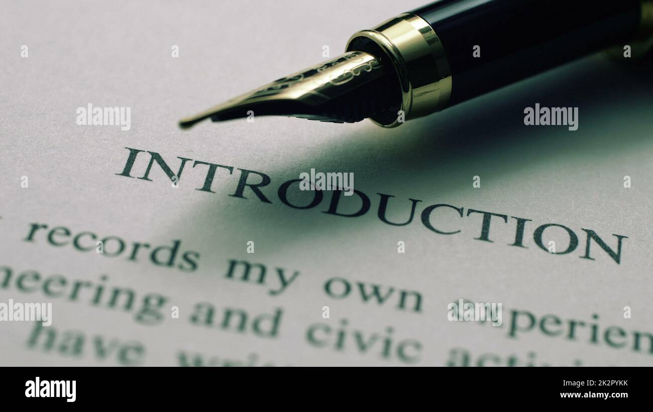 Fountain pen on introduction text shallow depth of field Stock Photo