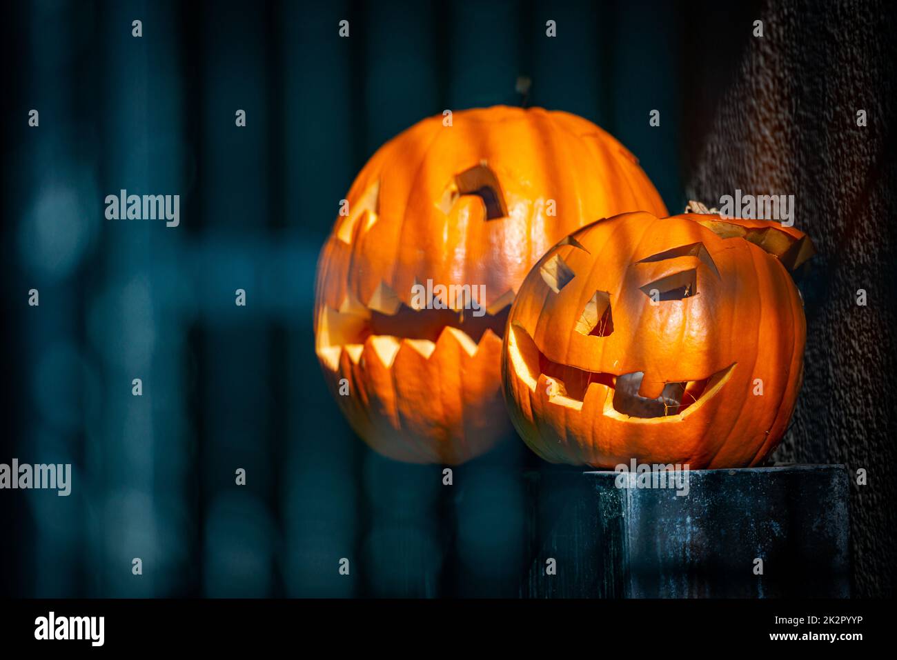 Two pumpkins carved for Halloween celebraiton Stock Photo