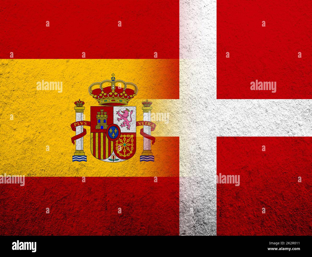 the Kingdom of Denmark National flag with Kingdom of Spain National flag. Grunge Background Stock Photo