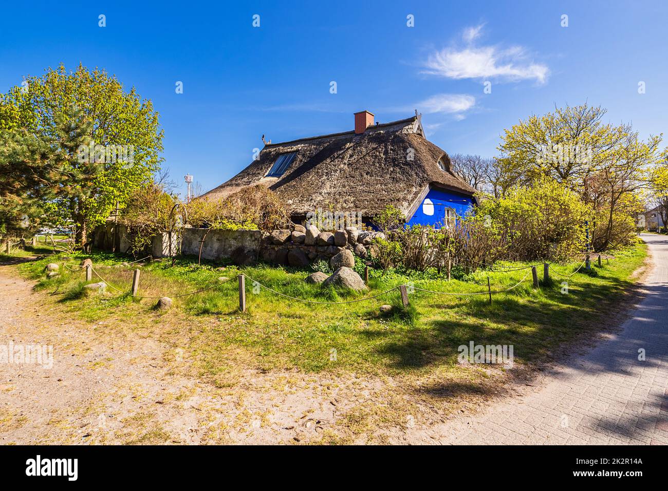 Historical building with thatched roof in Vitte on the island Hiddensee, Germany Stock Photo