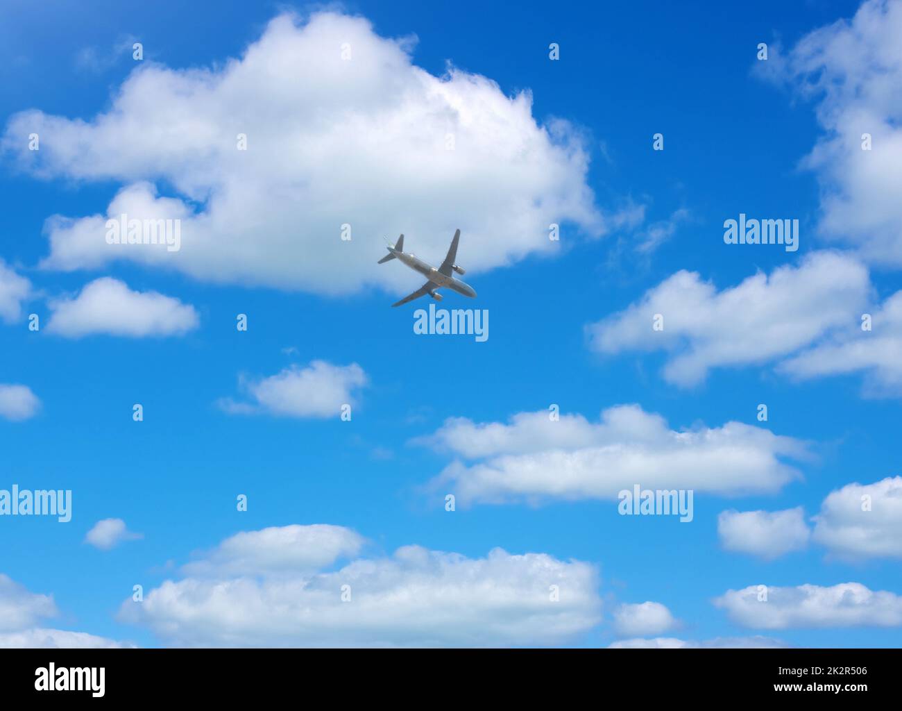 Passenger airplane in clouds hi-res stock photography and images - Alamy