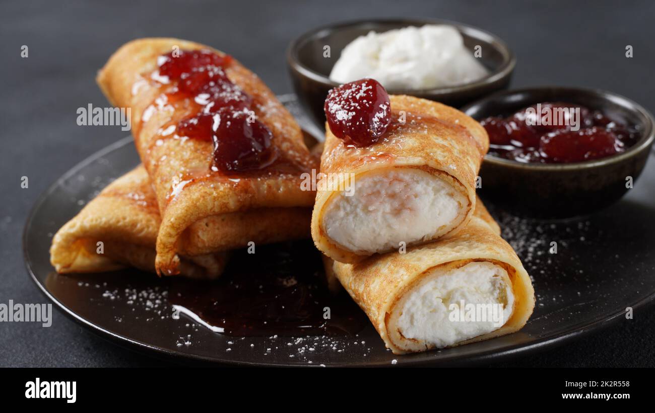 Pancakes with sweet cottage cheese and strawberry jam for breakfast Stock Photo Alamy