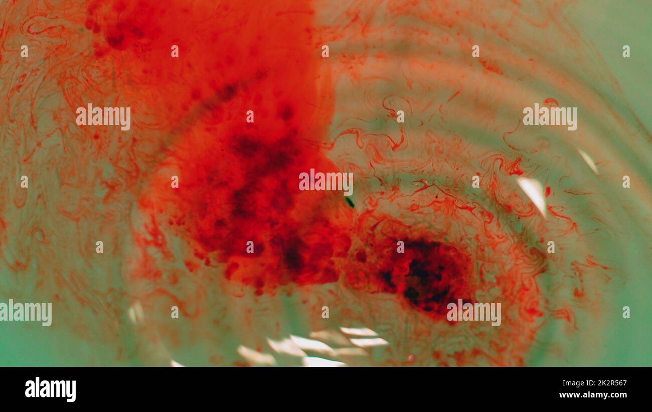 Blood Drops Flowing In Water Stock Photo - Alamy