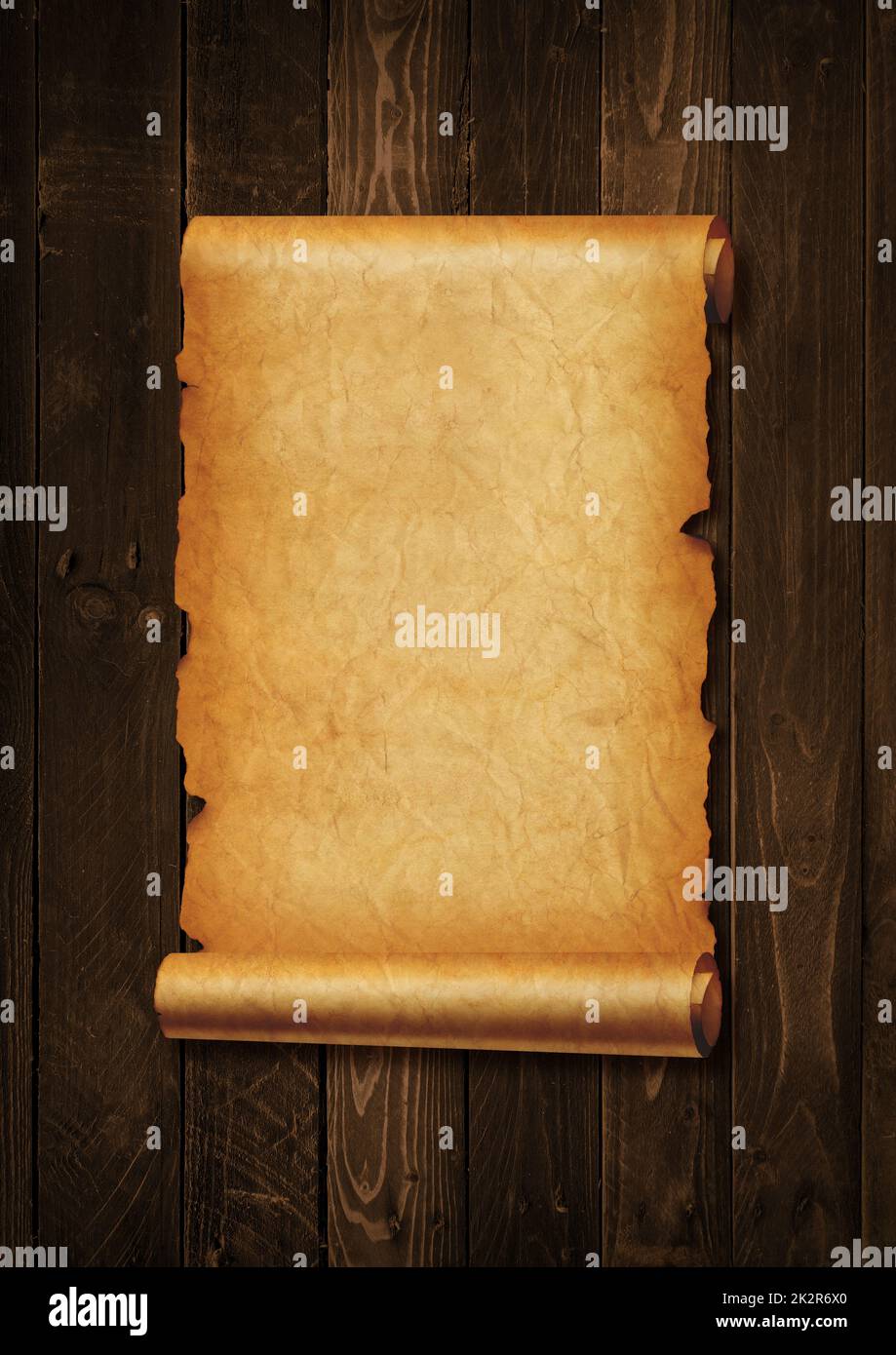 Old mediaeval paper sheet. Parchment scroll on a wood board Stock Photo Alamy