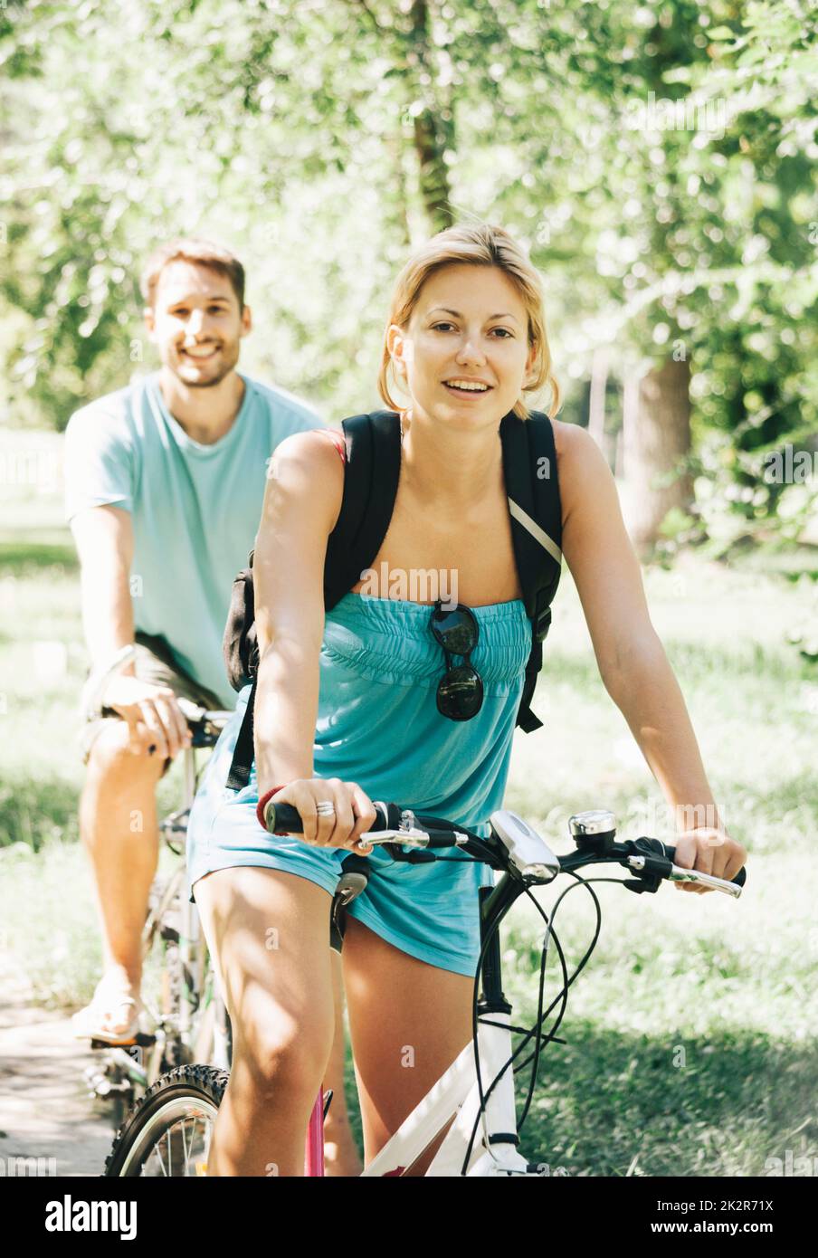 Happy couple riding bicycle Stock Photo