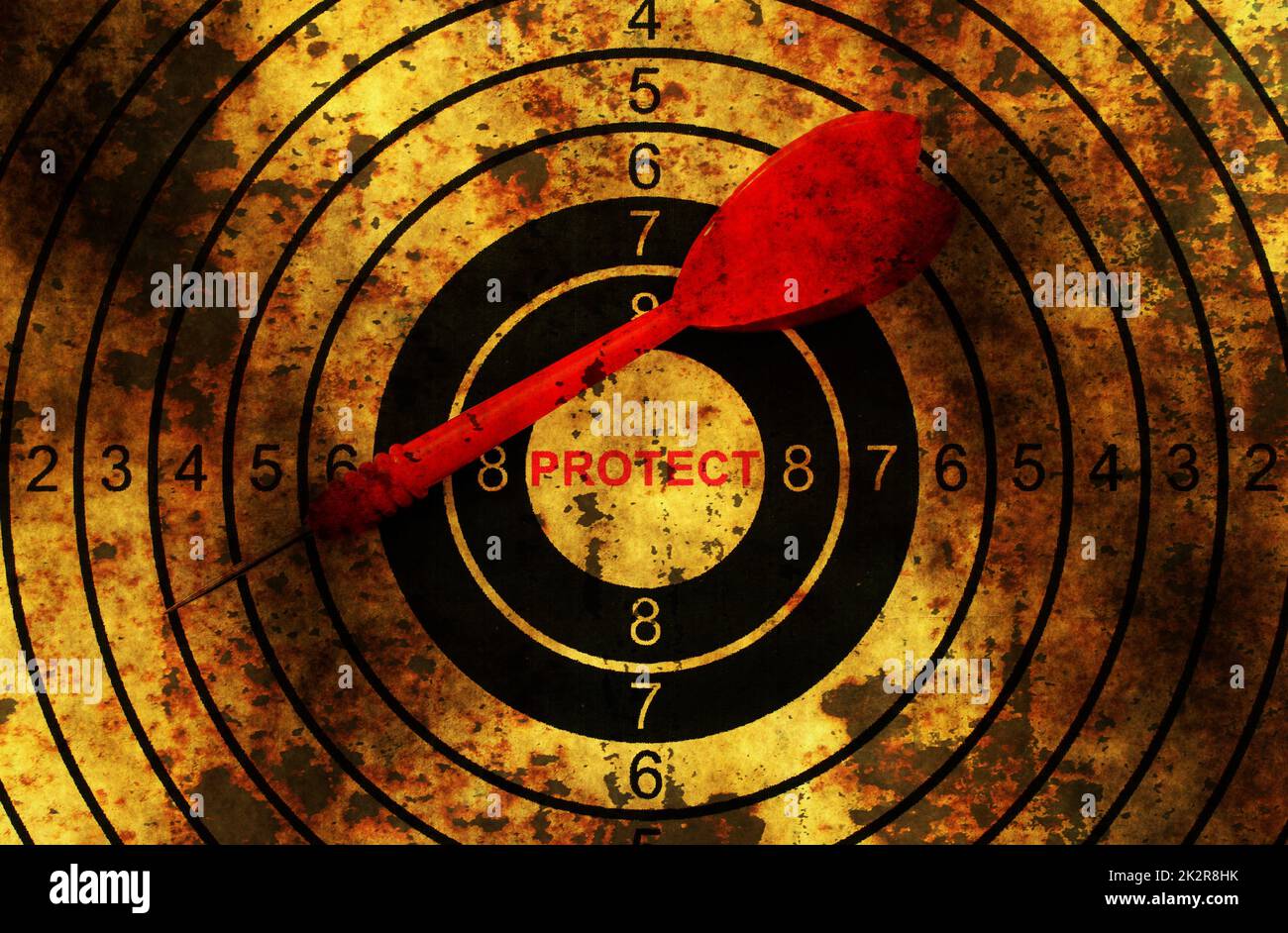 Dart on grunge protect target concept Stock Photo