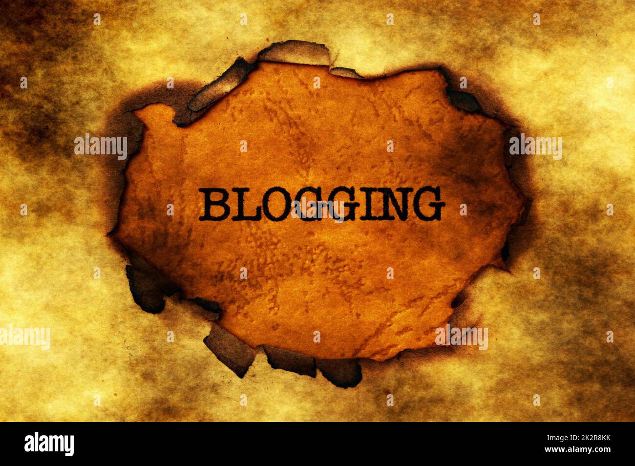 Blogging text on paper hole Stock Photo