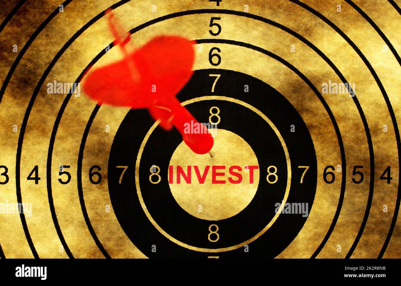 Invest target concept on grunge background Stock Photo