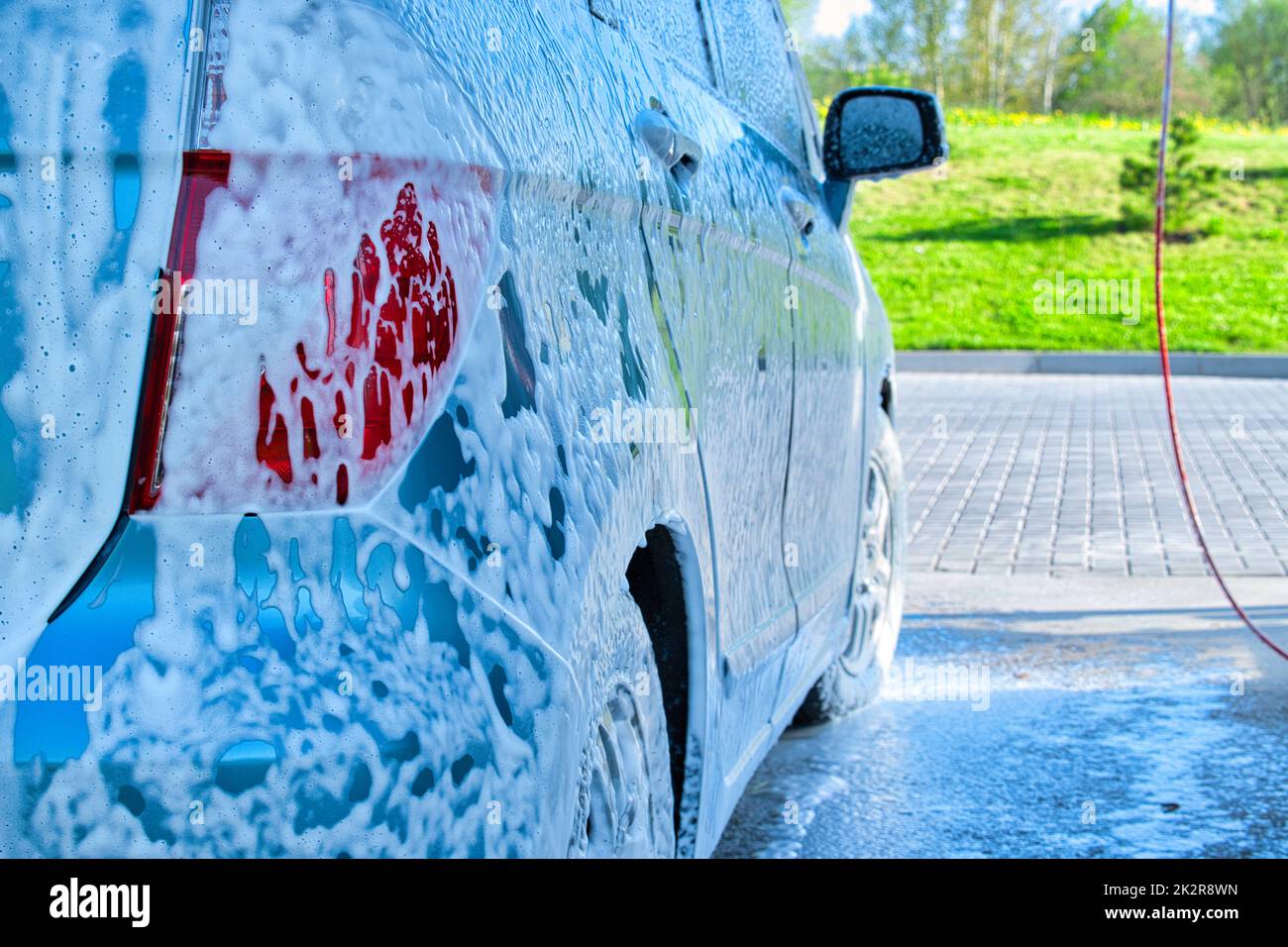 Car exterior cleaning, applying snow foam on dirty auto surface from  high-pressure washer 11317107 Stock Photo at Vecteezy