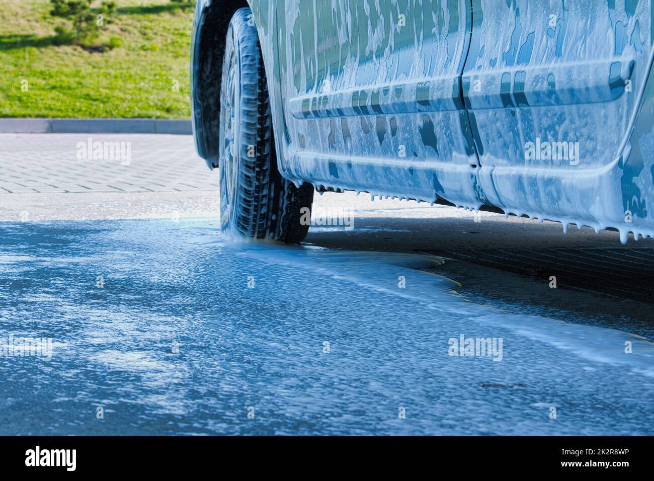 Washing car with active foam shampoo Stock Photo Alamy