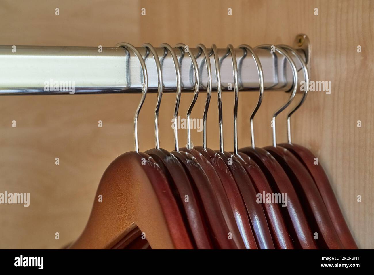 Empty hangers in a wardrobe Stock Photo Alamy