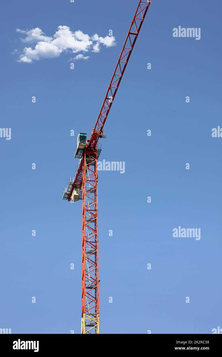 construction crane against the cloudy sky Stock Photo - Alamy