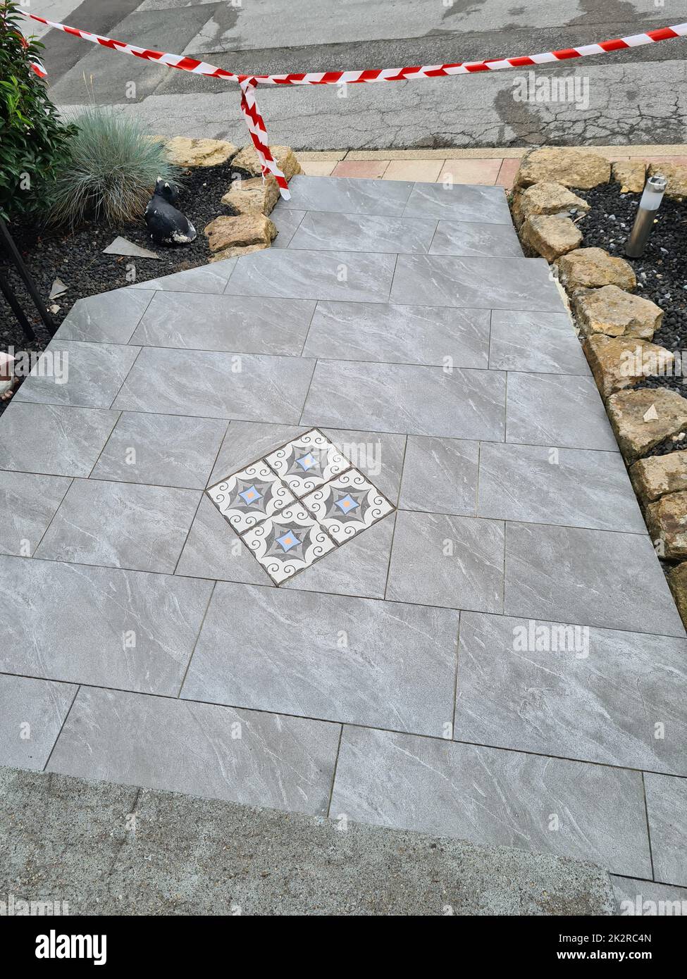 Laying floor tiles Stock Photo