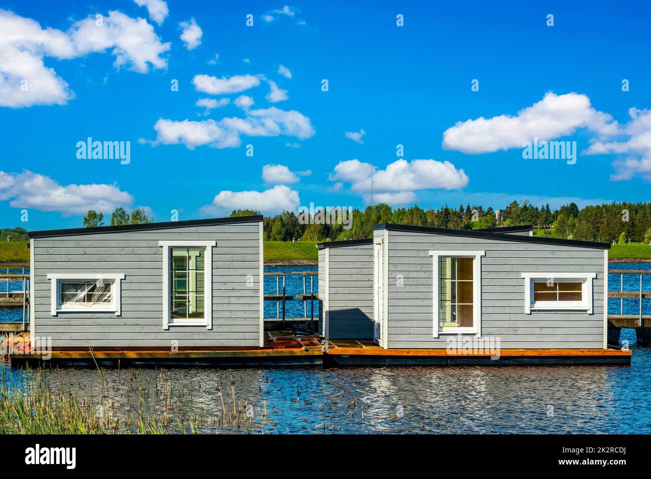 Floating fishing cabins on the lake water Stock Photo