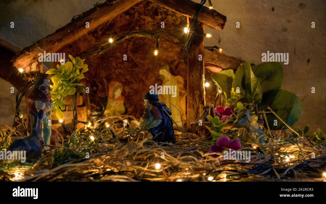 Christmas nativity scene with lights and images Stock Photo