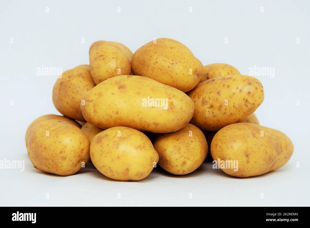 Fresh organic potatoes on white background Stock Photo