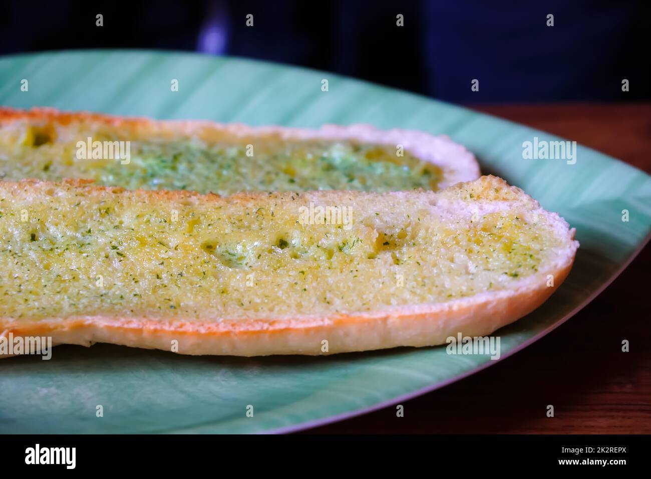 Garlic bread, white bread with garlic butter, still life, closeup and detail view Stock Photo