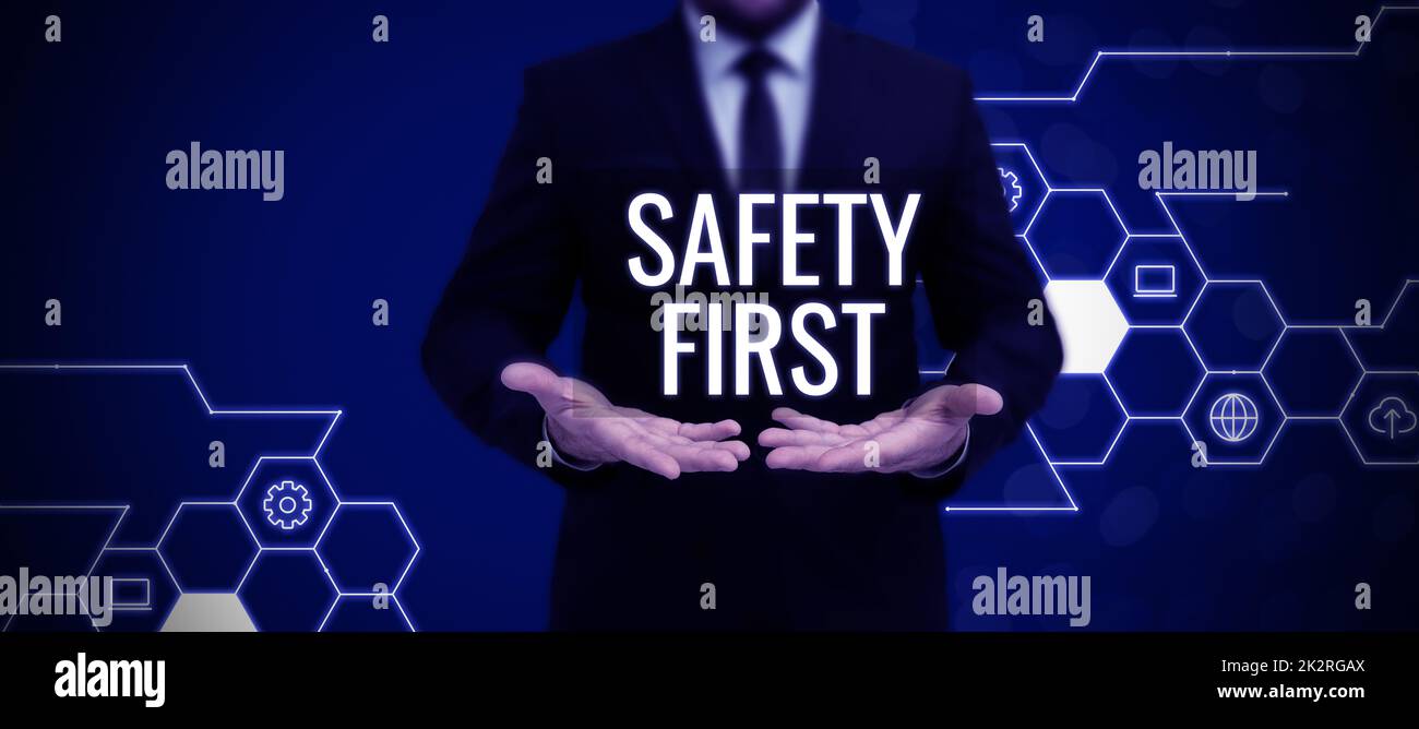 Hand writing sign Safety First. Conceptual photo Avoid any unnecessary ...